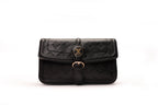 KARRYOL black leather Kari crossbody bag with embossed monogram panel and gold-tone hardware, perfect for work or casual outings.