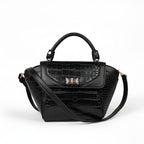 Karryol Lolita black mock-croc embossed crossbody bag with top handle and gold-tone hardware.