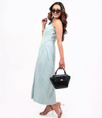 Karryol Lolita black mock-croc embossed crossbody bag with gold-tone hardware and structured silhouette.