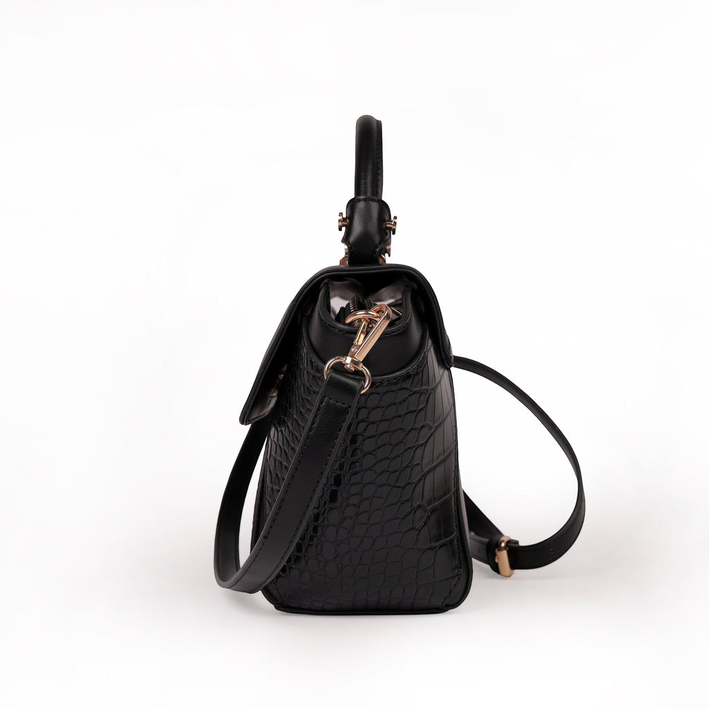 KARRYOL Lolita black mock-croc embossed crossbody bag with top handle and gold-tone hardware.