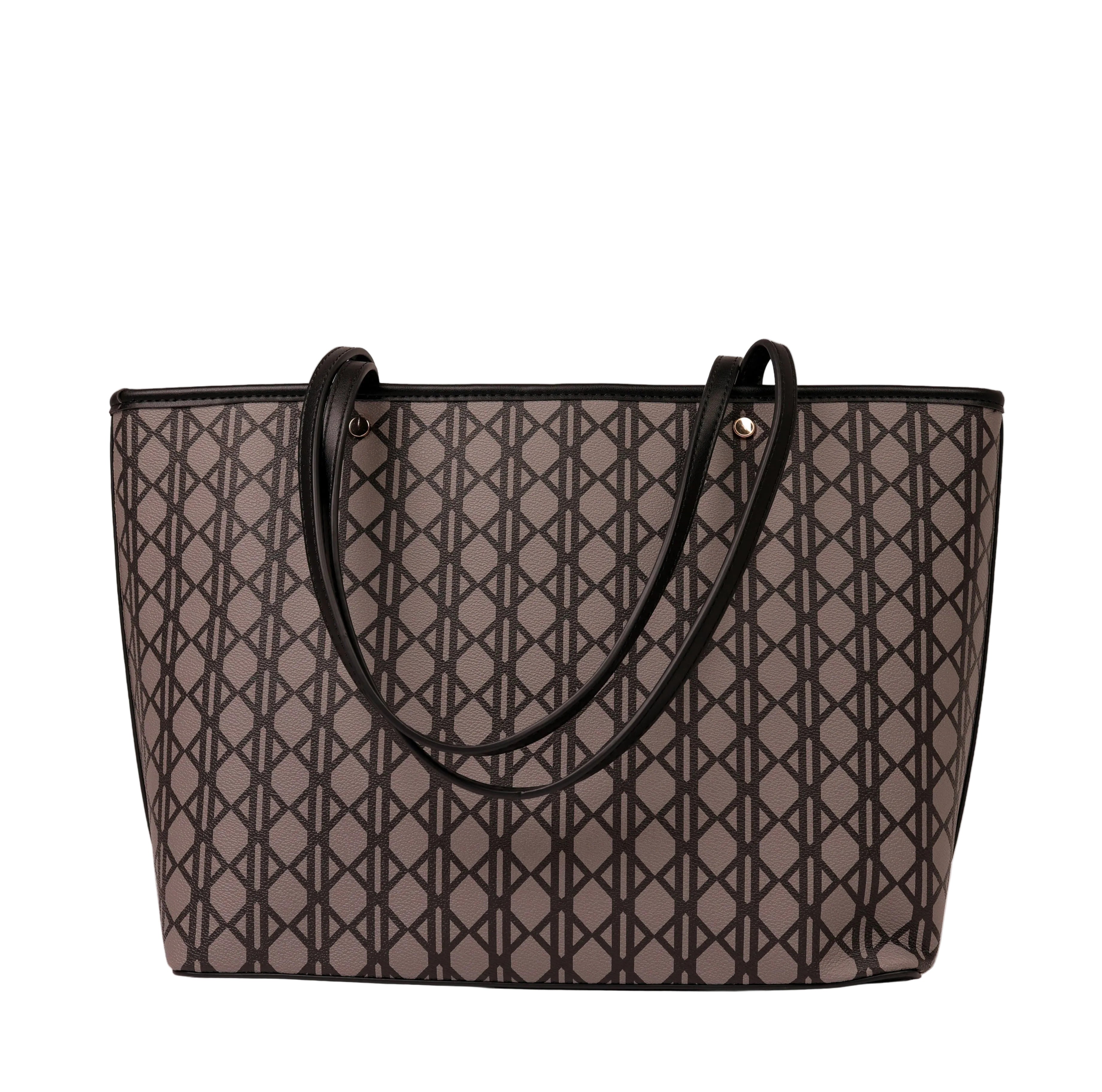Patterned handbag with black handles on a white background